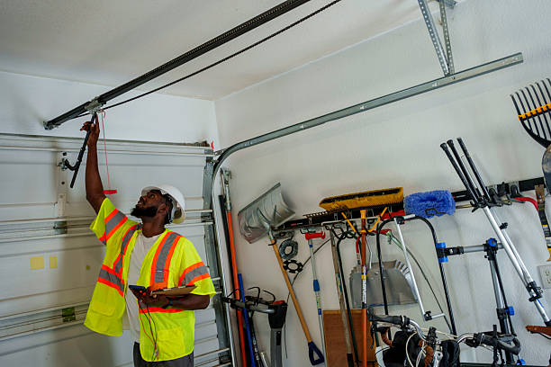 Professional Garage Door Roller Replacement technician working in Hillsdale, MI